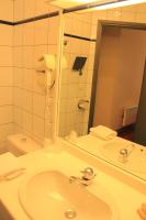 Een badkamer bij H&ocirc;tel Foch