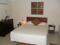 Allamanda Hotelにあるベッド