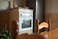 A kitchen or kitchenette at CASA RURAL EL SAUCE. A 2,5 KM DE CUENCA CAPITAL