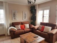 A seating area at CASA RURAL EL SAUCE. A 2,5 KM DE CUENCA CAPITAL