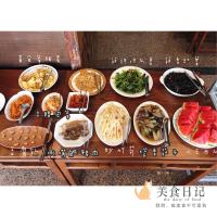 a table with many different dishes of food on it at Chun Feng Cao Tang Homestay in Yuanshan