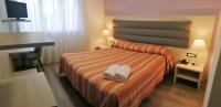 Łóżko lub łóżka w pokoju w obiekcie Hotel Kristall