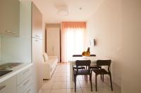 A kitchen or kitchenette at Miriam Hotel & Residence