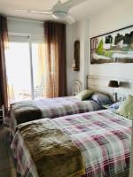 Postel nebo postele na pokoji v ubytování Duplex Villamarina