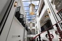 an internal view of a building with a glass ceiling at Liu Men Melaka in Melaka