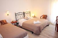 Łóżko lub łóżka w pokoju w obiekcie Hotel Verde Luna