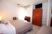 Łóżko lub łóżka w pokoju w obiekcie Hotel Verde Luna