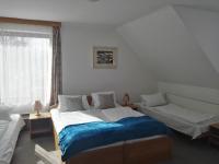 Postel nebo postele na pokoji v ubytování Hotel Jestřábí
