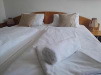 Postel nebo postele na pokoji v ubytování Hotel Jestřábí