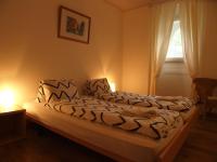 Postel nebo postele na pokoji v ubytování Hôtel Garni Villa Carmen