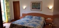 Posteľ alebo postele v izbe v ubytovaní Hotel Tirreno