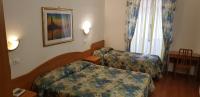 Posteľ alebo postele v izbe v ubytovaní Hotel Tirreno