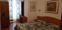 Posteľ alebo postele v izbe v ubytovaní Hotel Tirreno