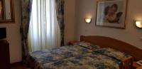 Posteľ alebo postele v izbe v ubytovaní Hotel Tirreno