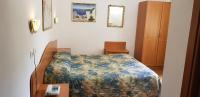 Posteľ alebo postele v izbe v ubytovaní Hotel Tirreno