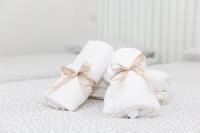 A bed or beds in a room at Rosy House - Hospitality