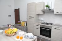 A kitchen or kitchenette at Rosy House - Hospitality