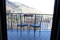 A balcony or terrace at Rosy House - Hospitality