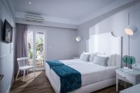 Posteľ alebo postele v izbe v ubytovaní Mari Kristin Beach Hotel