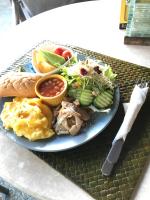 a blue plate of food on a table at The Deer Head Inn in Kenting