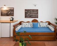 Łóżko lub łóżka w pokoju w obiekcie Kastro Suites