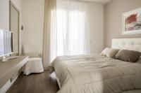Posteľ alebo postele v izbe v ubytovaní Home Suites Home