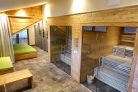 a room with a sauna with wooden walls at Camping Bissen in Esch-sur-Sûre
