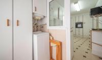 Kuchyň nebo kuchyňský kout v ubytování TarracoHomes, Apartamento Rosa Salou con Terraza y Vistas a la Playa