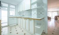 Kuchyň nebo kuchyňský kout v ubytování TarracoHomes, Apartamento Rosa Salou con Terraza y Vistas a la Playa