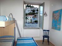 A bed or beds in a room at Grottammare mon amour Marina Grande