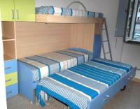 A bed or beds in a room at Grottammare mon amour Marina Grande