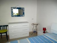 A bed or beds in a room at Grottammare mon amour Marina Grande
