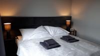Posteľ alebo postele v izbe v ubytovaní Apartament Stara Gazownia