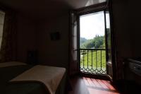 Postel nebo postele na pokoji v ubytování Hotel El Repelao