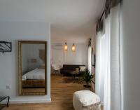 A bed or beds in a room at Bohórquez Rooms by Ático73