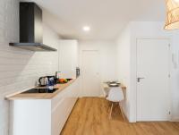 A kitchen or kitchenette at Bohórquez Rooms by Ático73