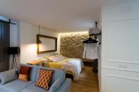 A bed or beds in a room at Bohórquez Rooms by Ático73
