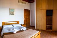 Posteľ alebo postele v izbe v ubytovaní Papanestoras Apartments
