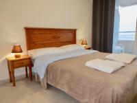 A bed or beds in a room at Clubrent - Apartamentos Apolo 16