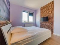Posteľ alebo postele v izbe v ubytovaní Apartament Wakacyjny z tarasem