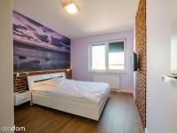 Posteľ alebo postele v izbe v ubytovaní Apartament Wakacyjny z tarasem