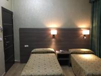 Postel nebo postele na pokoji v ubytování Hotel Nacional Melilla