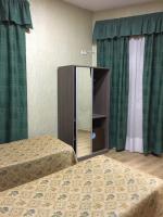 Postel nebo postele na pokoji v ubytování Hotel Nacional Melilla