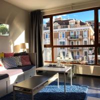 A seating area at APARTELLO Modern Apartment - Balkan Breeze 7