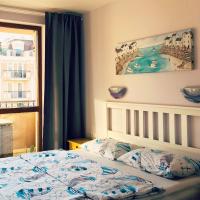 A bed or beds in a room at APARTELLO Modern Apartment - Balkan Breeze 7