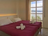 A bed or beds in a room at Fuentes de Nerja