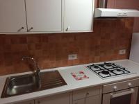 A kitchen or kitchenette at Appartamenti Monte Alago