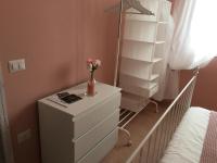 A bed or beds in a room at Appartamenti Monte Alago