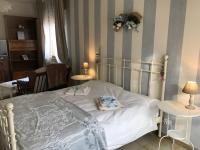 Posteľ alebo postele v izbe v ubytovaní Casa Giulietta