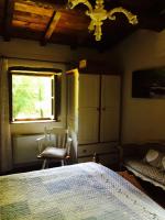 A bed or beds in a room at Relax totale nel Bosco Lucca
